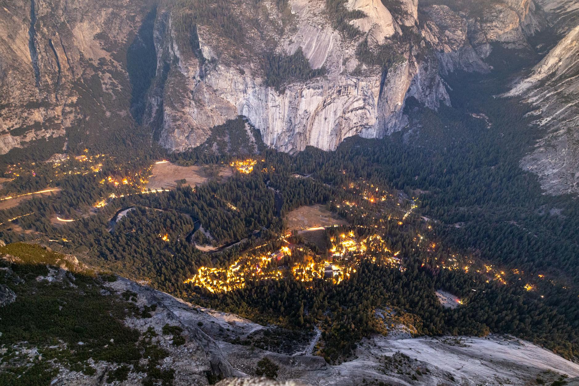 Stunning aerial view of Yosemite Valley illuminated at sunset, showcasing natural beauty.
