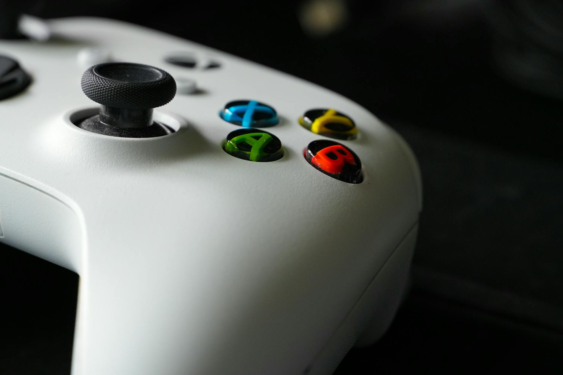 Focus on Xbox controller buttons highlighting gaming technology and design.